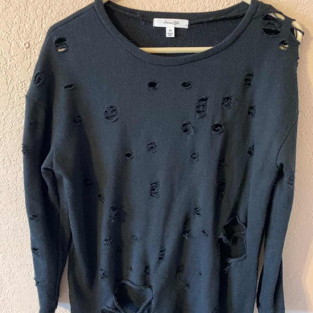 Never worn Holy sweatshirt.